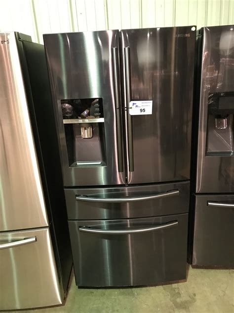 black stainless steel refrigerator with ice maker