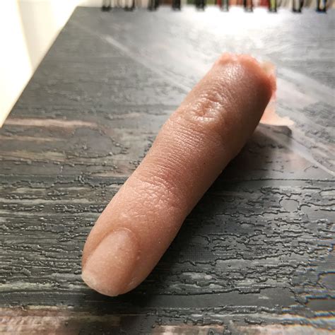 cut off finger wax model, House of wax finger cut off
