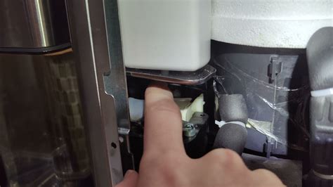 ge profile ice maker squeaking