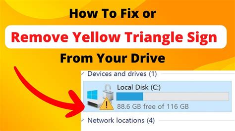 hard drive showing yellow triangle, Why is my c: drive showing an exclamation mark?
