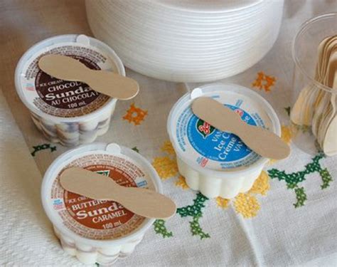 ice cream cups with wooden spoon
