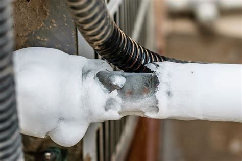 ice on air conditioner pipe outside