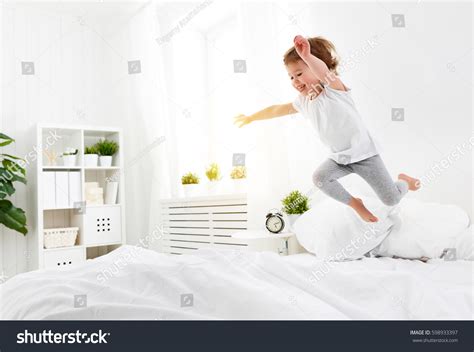 jumping on a bed