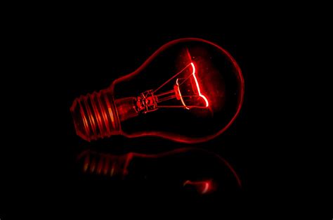 led light bulb red background, Led light bulbs on red background top view stock image