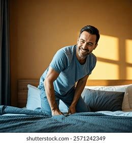 miserable man getting out of bed, 7,441 getting out bed man images, stock photos & vectors
