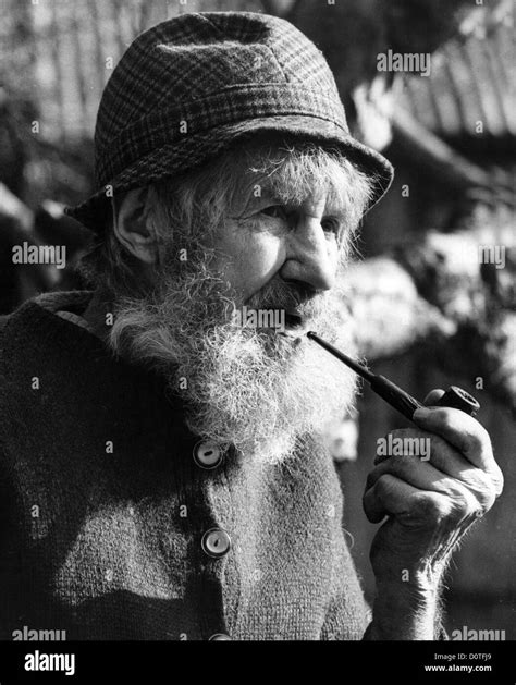old bearded man smoking pipe, Senior smoking a pipe