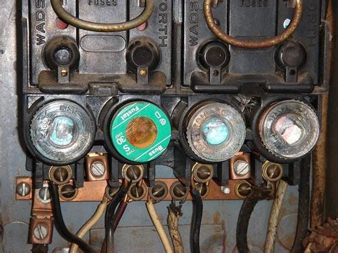 penny in an old fuse box 