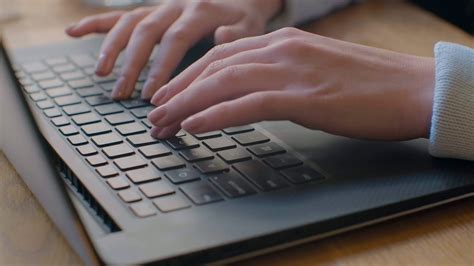 someone typing on a computer keyboard, Typing computer laptop writing keyboard hands woman office close up stock video. Woman typing on laptop keyboard in office stock footage sbv-334813753