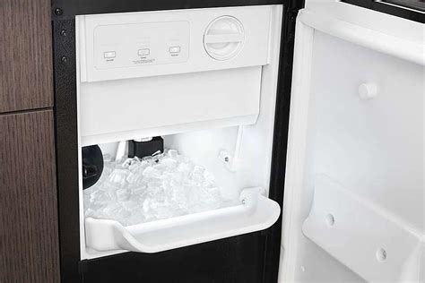 water pouring out of ice maker whirlpool